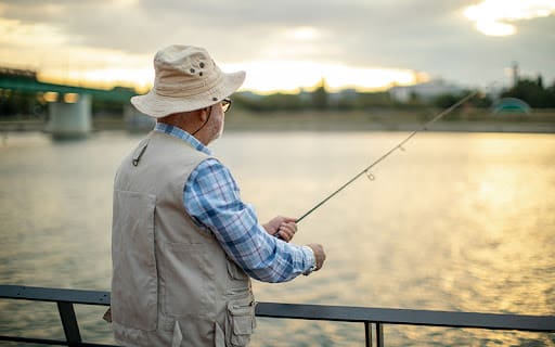 senior man enjoying retirement while fishing
